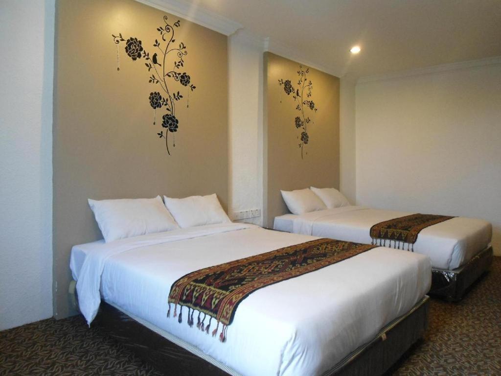 Regent Hotel Бинтулу Екстериор снимка